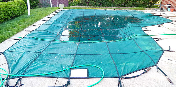 On Adjusting Safety Pool Cover Straps - In The Swim Pool Blog