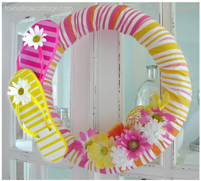 Flip Flop Wreath, from Fox Hollow Cottage, shows how to make a pool noodle wreath, for any season!