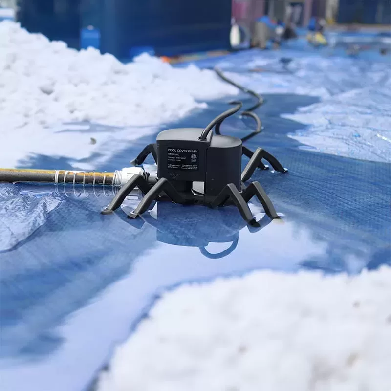 use a cover pump to remove melted snow from pool cover