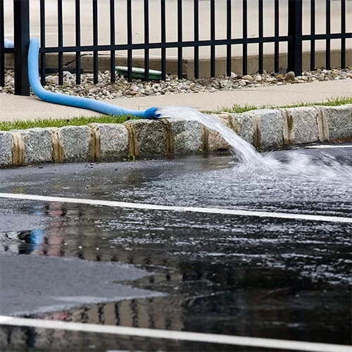 draining a pool into the street with a backwash hose