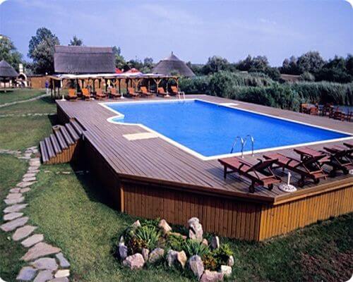 above ground pool with platform style wooden deck