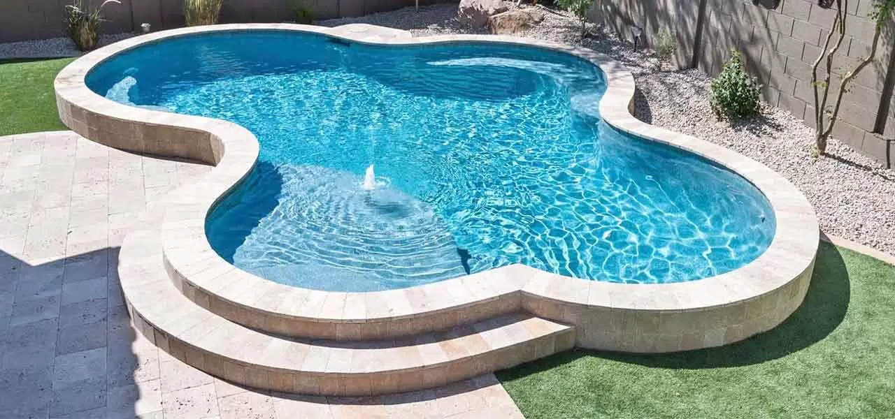 freeform pool with small fountain