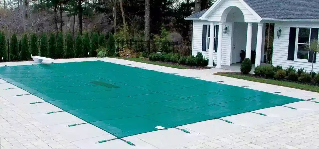 Mesh vs. Solid Safety Pool Covers - Which is Best? - In The Swim