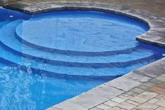 vinyl pool with tanning ledge
